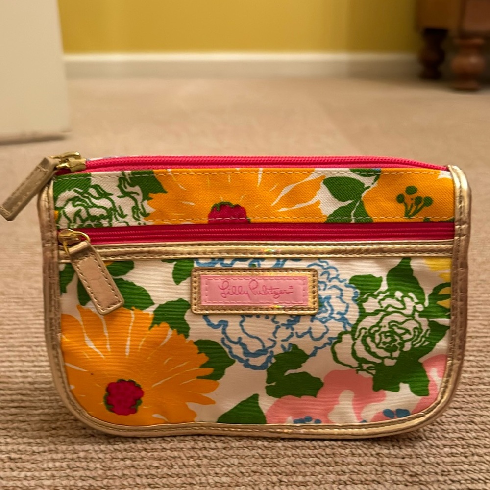 Lilly Pulitzer cosmetic case. EUC. Probably never used. Front zipper pocket.